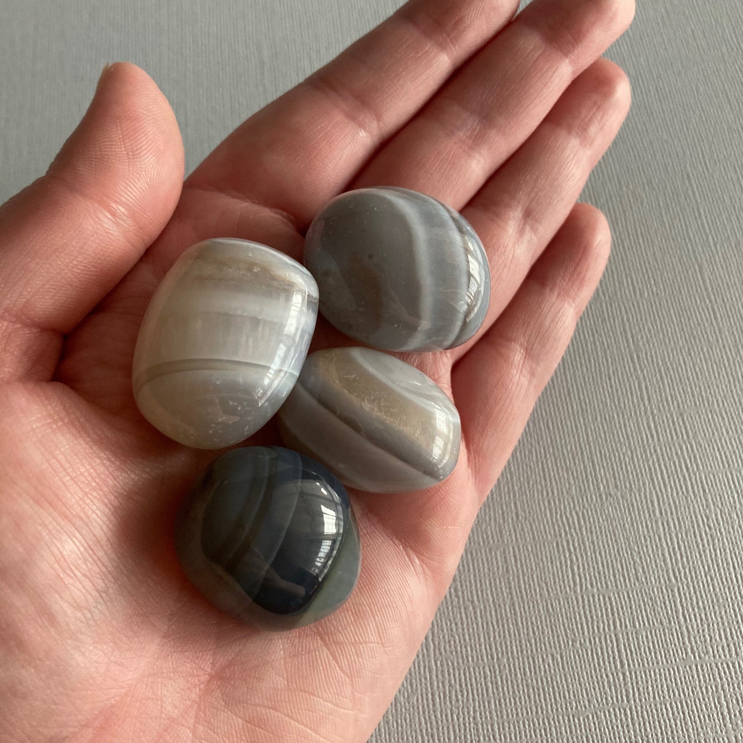 A handful of Blue Agate tumble stones